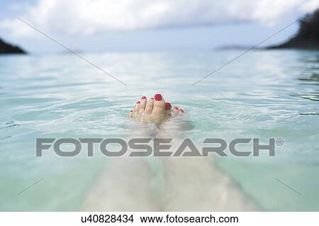USA, Virgin Islands, Saint Thomas, Female feet in sea View Large Photo Image Picture - USA, Virgin Islands, Saint Thomas, Female feet in sea. Fotosearch