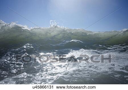 Waves on sunny day View Large Photo Image Stock Image - Waves on sunny day. Fotosearch