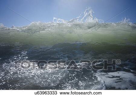 Waves on sunny day View Large Photo Image Stock Image - Waves on sunny day. Fotosearch