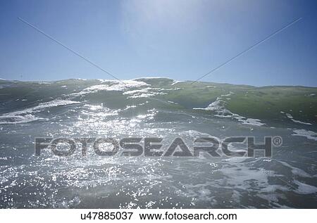 Waves on sunny day View Large Photo Image Stock Photo - Waves on sunny day. Fotosearch