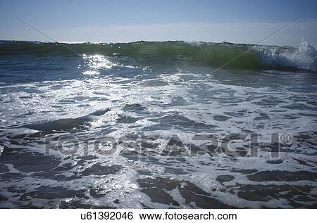 Waves on sunny day View Large Photo Image Stock Photograph - Waves on sunny day. Fotosearch