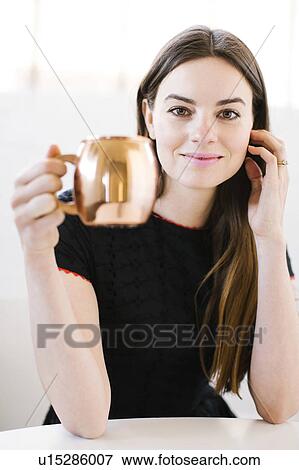 Woman drinking hot chocolate View Large Photo Image Stock Photo - Woman drinking hot chocolate. Fotosearch