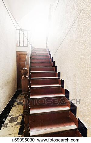 Wooden staircase in light View Large Photo Image Stock Image - Wooden staircase in light. Fotosearch