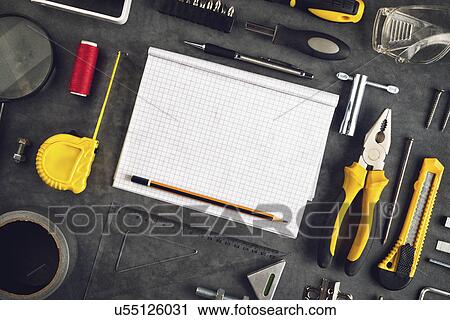 Stock Image - Assorted Do It Yourself tools and notebook. Fotosearch