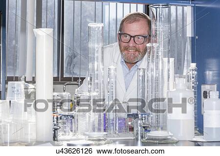 Stock Photograph - Chemist in water treatment lab.. Fotosearch