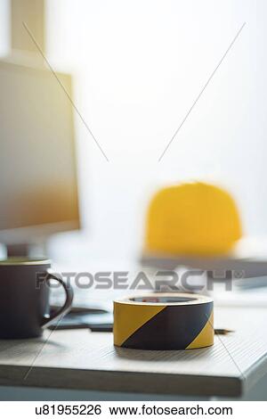Stock Photograph - Desk in construction office. Fotosearch