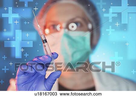 Doctor with syringe View Large Photo Image Stock Image - Doctor with syringe. Fotosearch
