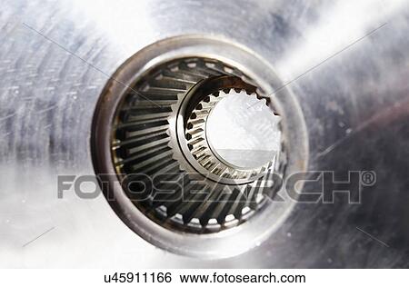 Giant gear axle shaft made from titanium and steel and used in the aerospace industry. View Large Photo Image Stock Photograph - Giant gear axle shaft made from titanium and steel and used in the aerospace industry.. Fotosearch