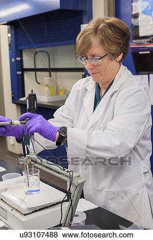 Lab technician preparing pH probe. View Large Photo Image Stock Photo - Lab technician preparing pH probe.. Fotosearch