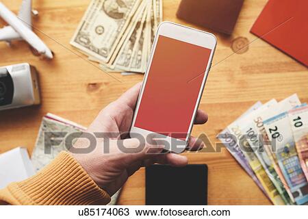Male hand holding smartphone View Large Photo Image Stock Image - Male hand holding smartphone. Fotosearch