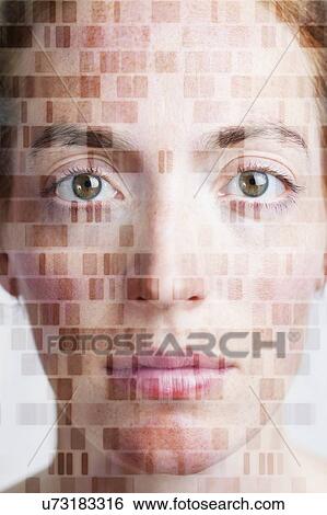 Stock Photograph - MODEL RELEASED. Conceptual composite image of a young woman's face with DNA (deoxyribonucleic acid).. Fotosearch