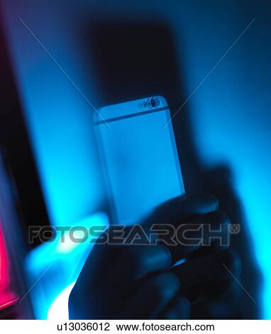 MODEL RELEASED. Smartphone use. View Large Photo Image Stock Image - MODEL RELEASED. Smartphone use.. Fotosearch
