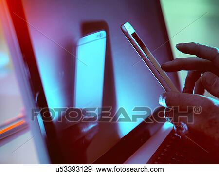 MODEL RELEASED. Smartphone use. View Large Photo Image Stock Photo - MODEL RELEASED. Smartphone use.. Fotosearch