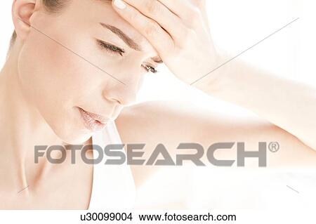 MODEL RELEASED. Young woman in pain with headache, close up. View Large Photo Image Picture - MODEL RELEASED. Young woman in pain with headache, close up.. Fotosearch