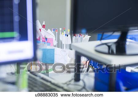 Stock Photography - NMR (nuclear magnetic resonance) spectroscopy phials in a pharmaceutical laboratory.. Fotosearch