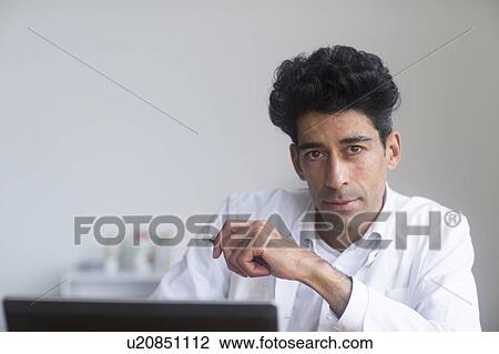 Portrait of a male doctor View Large Photo Image Stock Image - Portrait of a male doctor. Fotosearch