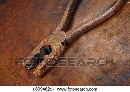 Stock Photo - Rusty pliers.. Fotosearch