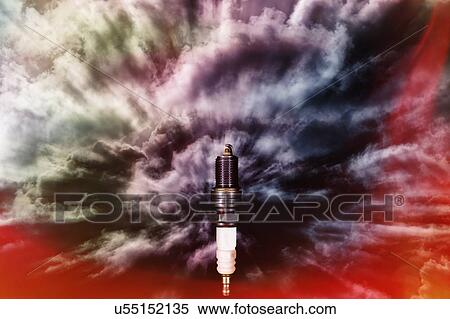 Stock Photography - Spark plug receiving energy and power from stormy sky.. Fotosearch