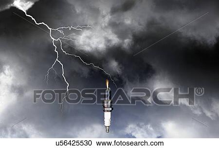 Stock Image - Spark plug receiving power and energy from lightning.. Fotosearch