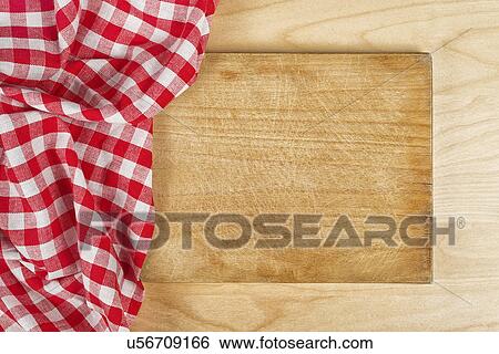 Stock Photograph - Tablecloth on wooden background. Fotosearch