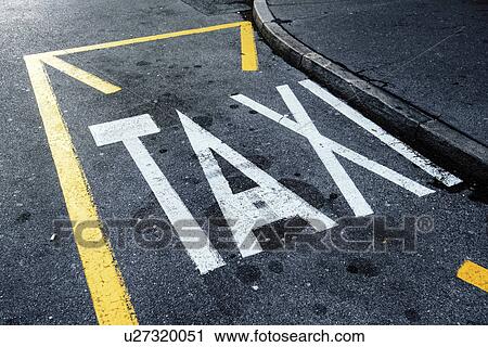 Stock Image - Taxi stand imprint on asphalt road. Fotosearch