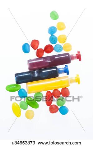 Three containers with red, blue and yellow liquid spots, studio shot. View Large Photo Image Stock Photo - Three containers with red, blue and yellow liquid spots, studio shot.. Fotosearch