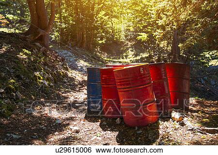 Toxic waste barrels in forest View Large Photo Image Stock Photograph - Toxic waste barrels in forest. Fotosearch