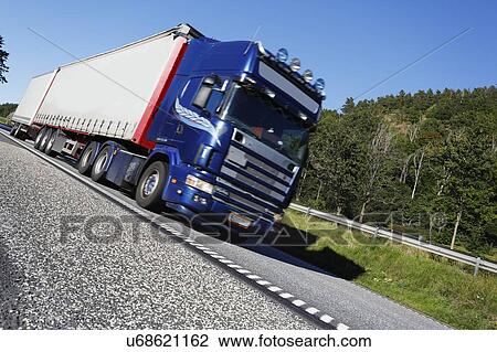 Stock Image - Truck on highway.. Fotosearch