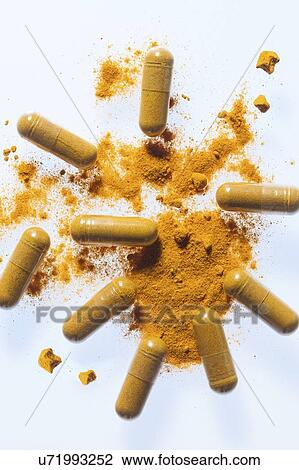 Turmeric supplement capsules and powder, studio shot. View Large Photo Image Stock Image - Turmeric supplement capsules and powder, studio shot.. Fotosearch
