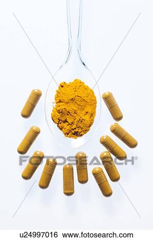 Turmeric supplement capsules and powder, studio shot. View Large Photo Image Stock Photograph - Turmeric supplement capsules and powder, studio shot.. Fotosearch