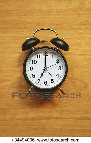 Vintage alarm clock View Large Photo Image Stock Photograph - Vintage alarm clock. Fotosearch