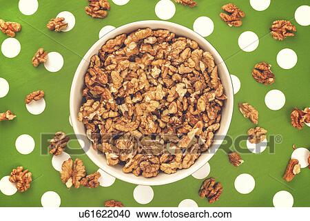 Walnut kernels in ceramic bowl View Large Photo Image Stock Image - Walnut kernels in ceramic bowl. Fotosearch