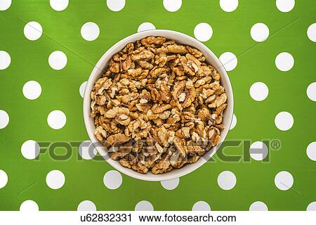 Walnut kernels in ceramic bowl View Large Photo Image Stock Image - Walnut kernels in ceramic bowl. Fotosearch