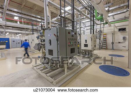 Water treatment plant chemical treatment equipment control panels. View Large Photo Image Picture - Water treatment plant chemical treatment equipment control panels.. Fotosearch