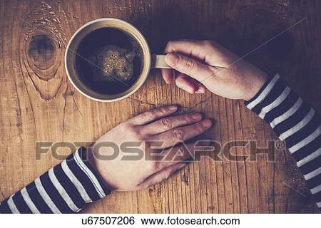 Stock Photograph - Woman drinking coffee. Fotosearch