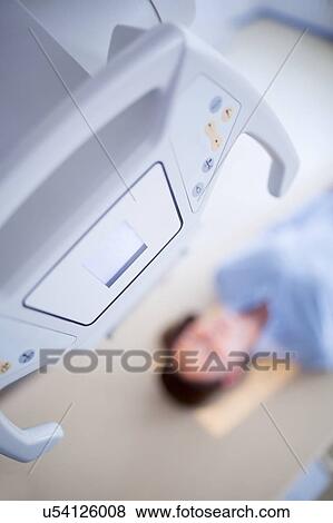 Stock Photo - Woman having X-ray.. Fotosearch