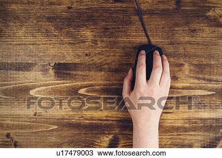 Woman using computer mouse View Large Photo Image Stock Image - Woman using computer mouse. Fotosearch