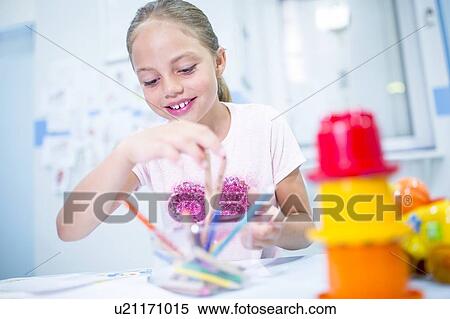 Young girl with colouring pencils, smiling. View Large Photo Image Stock Photography - Young girl with colouring pencils, smiling.. Fotosearch