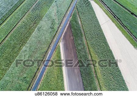 Stock Photo - Aerial view of road and fields. Fotosearch