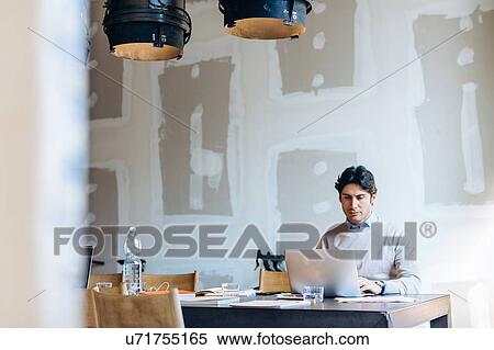 Architect using laptop View Large Photo Image Stock Photography - Architect using laptop. Fotosearch