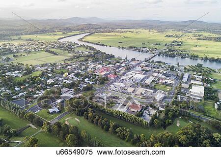 Stock Photography - Australia, New South Wales, Moruya, Landscape with town and Moruya river. Fotosearch