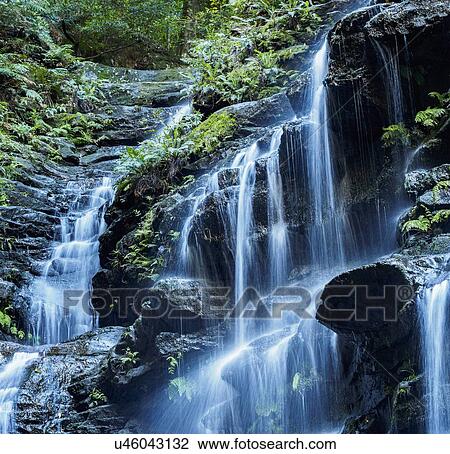 Stock Image - Australia, New South Wales, Waterfall called Wentworth Falls. Fotosearch