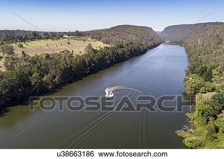 Stock Photograph - Australia, Sydney, Motorboat at Nepean river. Fotosearch