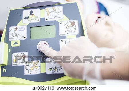 Automated external defibrillator training. View Large Photo Image Stock Image - Automated external defibrillator training.. Fotosearch