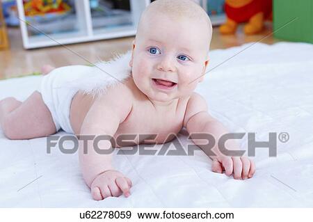 Baby boy crawling. View Large Photo Image Stock Photo - Baby boy crawling.. Fotosearch