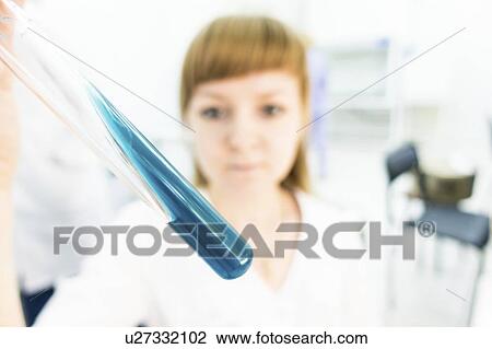 Biological research. Technician with solution. View Large Photo Image Stock Image - Biological research. Technician with solution.. Fotosearch