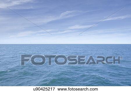 Stock Photo - Blue seascape with horizon over Atlantic Ocean. Fotosearch