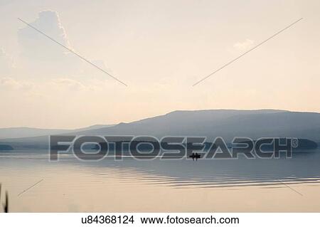 Boat on lake, Ural, Sverdlovsk, Russia View Large Photo Image Picture - Boat on lake, Ural, Sverdlovsk, Russia. Fotosearch