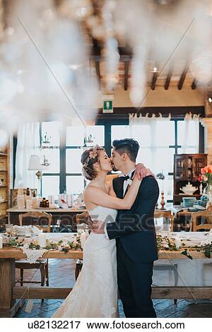 Bride and bridegroom dancing at wedding reception View Large Photo Image Stock Photo - Bride and bridegroom dancing at wedding reception. Fotosearch