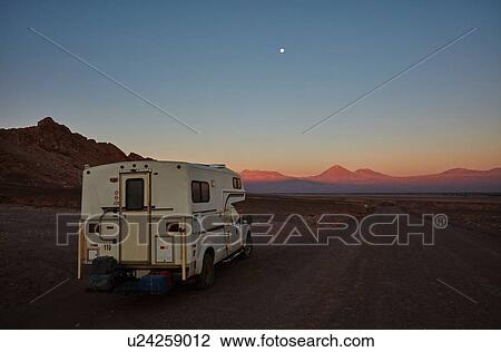 Campervan in Valle de la Luna at sunset, San Pedro, Atacama, Chile View Large Photo Image Stock Image - Campervan in Valle de la Luna at sunset, San Pedro, Atacama, Chile. Fotosearch